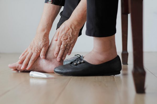 Diabetic foot ulcers can occur in patients due to ill-fitting shoes or walking barefoot in combination with nerve damage. 
